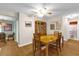 Dining room featuring laminated floors, ceiling fan, and wood furniture at 8814 Sw 93Rd Ln # B, Ocala, FL 34481