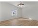 Bright bedroom featuring light-colored floors and large windows offering plenty of natural light at 909 Cajon Ct, The Villages, FL 32159