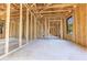 Spacious interior displays unfinished wooden framing, a bright space with a solid foundation at Lot 3 Indian Estates Cr 423, Lake Panasoffkee, FL 33538