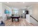 Large, bright recreation room featuring wood floors, pool table, and comfortable seating with neutral colors at 1111 Myrtle Breezes Ct, Fruitland Park, FL 34731