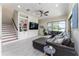 Inviting living room features a comfortable sectional sofa and a picturesque lake view at 1111 Myrtle Breezes Ct, Fruitland Park, FL 34731