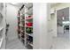 Walk-in pantry with abundant shelving for organized storage at 1111 Myrtle Breezes Ct, Fruitland Park, FL 34731
