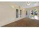 Sun room with natural light and multiple doors for access to the outdoors at 1329 Gaston Loop, The Villages, FL 32162