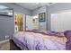 This is a bedroom with a walk-in closet and an attached bathroom at 16200 E Shirley Shores Rd, Tavares, FL 32778