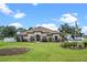 Charming single-story home with a tile roof, well-manicured lawn, and inviting curb appeal at 16200 E Shirley Shores Rd, Tavares, FL 32778
