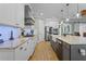 Well-equipped kitchen with stainless steel appliances, granite countertops, and an open layout at 16200 E Shirley Shores Rd, Tavares, FL 32778