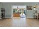 Open living area with access to the lanai and pool, offering seamless indoor-outdoor living at 16200 E Shirley Shores Rd, Tavares, FL 32778