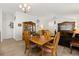 Open concept dining room flows into a living space, ideal for entertaining and gatherings at 1633 Manserra St, The Villages, FL 32163