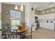 Cozy kitchen with stainless appliances and breakfast nook at 1633 Manserra St, The Villages, FL 32163