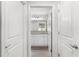 En-suite bathroom with granite counters, dual sinks, and ample storage at 16380 Se 84Th Ct, Summerfield, FL 34491