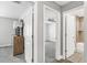 Hallway showcasing access to the bedroom and bathroom at 16380 Se 84Th Ct, Summerfield, FL 34491