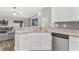 Well-equipped kitchen with granite countertops and open layout at 16380 Se 84Th Ct, Summerfield, FL 34491