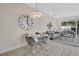 Dining nook that complements a comfortable living space with sleek decor at 17519 Hidden Forest Dr, Clermont, FL 34714