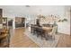 Open concept features a dining area and custom bar and living room, great for entertaining at 602 Cr 489, Lake Panasoffkee, FL 33538