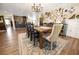 Elegant dining room featuring a long wooden table and decorative accents, perfect for gatherings at 602 Cr 489, Lake Panasoffkee, FL 33538