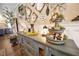 Rustic chic hallway decor with farmhouse decorations and a stylish tiered tray at 602 Cr 489, Lake Panasoffkee, FL 33538