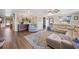 Spacious living room with stylish furniture, wood floors, and ample natural light at 602 Cr 489, Lake Panasoffkee, FL 33538