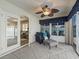 Relaxing sun room features tile flooring, natural light, and neutral paint at 632 Delgado Ave, The Villages, FL 32159