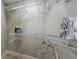 Walk-in closet has custom metal shelving for optimal storage and organization at 632 Delgado Ave, The Villages, FL 32159