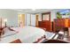 Bright primary bedroom offering nice furniture, ample closet space and natural light at 917 Camino Del Rey Dr, The Villages, FL 32159