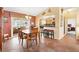 Inviting dining area with a view of the kitchen, perfect for Gathering gatherings at 917 Camino Del Rey Dr, The Villages, FL 32159