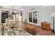 Cozy sunroom with tile floors and a view of the outdoors at 917 Camino Del Rey Dr, The Villages, FL 32159