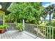Private outdoor living space overlooking lush landscaping and tranquil water views at 9642 Bear Lake Rd, Apopka, FL 32703