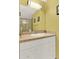Bathroom featuring a modern sink, countertop and a mirror at 9642 Bear Lake Rd, Apopka, FL 32703