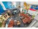 Spacious living room featuring a unique surf theme and a cozy fireplace at 9642 Bear Lake Rd, Apopka, FL 32703