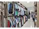 Extensive walk-in closet with custom shelving and ample storage space at 9642 Bear Lake Rd, Apopka, FL 32703