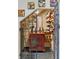 Unique wine cellar with custom wine racks and decorative iron gate at 9642 Bear Lake Rd, Apopka, FL 32703
