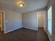 Cozy bedroom with luxury vinyl plank flooring and closet entrance at 15010 Sw 29Th Ave Road, Ocala, FL 34473