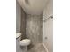 Beautiful tiled shower with multiple shower heads in a modern bathroom at 15010 Sw 29Th Ave Road, Ocala, FL 34473