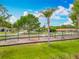 Community playground offering swings, mature landscaping, and a safe play area at 1001 N Lakeshore Blvd, Howey In The Hills, FL 34737