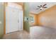 Bright foyer with tile flooring, ready for personalization at 1307 Rain Forest Ln, Minneola, FL 34715