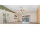 The bright living room offers plenty of space and natural light, perfect for entertaining at 1307 Rain Forest Ln, Minneola, FL 34715