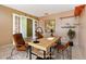 Cozy office space featuring a stylish desk, warm lighting, and modern decor, perfect for a productive workspace at 1307 Rain Forest Ln, Minneola, FL 34715