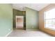 Spacious room with tile flooring and a walk-in closet at 1307 Rain Forest Ln, Minneola, FL 34715