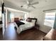 A spacious bedroom features hardwood flooring and large windows at 1414 Margate Ave, Orlando, FL 32803
