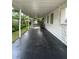 Spacious carport area with ample room and a view of the backyard at 1414 Margate Ave, Orlando, FL 32803