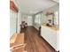 An open-concept entryway has hardwood floors and abundant sunlight at 1414 Margate Ave, Orlando, FL 32803