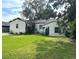 This is a charming single-story home with a well-manicured lawn at 1414 Margate Ave, Orlando, FL 32803