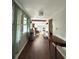 Hallway view shows hardwood flooring and transitions to the living room at 1414 Margate Ave, Orlando, FL 32803