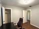 Office space featuring a doorway and closet with a desk and an executive chair at 1414 Margate Ave, Orlando, FL 32803