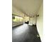 Large screened porch with a ceiling fan, offering an ideal spot for relaxation and entertainment at 1414 Margate Ave, Orlando, FL 32803