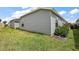 Exterior view of the home with well-maintained lawn and tidy landscaping at 1486 Joshua Ct, The Villages, FL 32163
