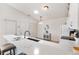 Modern kitchen with sleek countertops, a stylish faucet, and ample storage space at 1486 Olympia St, The Villages, FL 32163