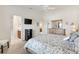 Comfortable main bedroom featuring a king bed, ample closet space, and an en-suite bathroom at 1486 Olympia St, The Villages, FL 32163