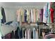 Spacious walk-in closet with ample shelving and hanging space for organized storage at 17036 Se 79Th Clearview Ave, The Villages, FL 32162