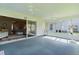 Spacious sunroom with sliding door access to the interior, offering natural light and scenic views at 17036 Se 79Th Clearview Ave, The Villages, FL 32162